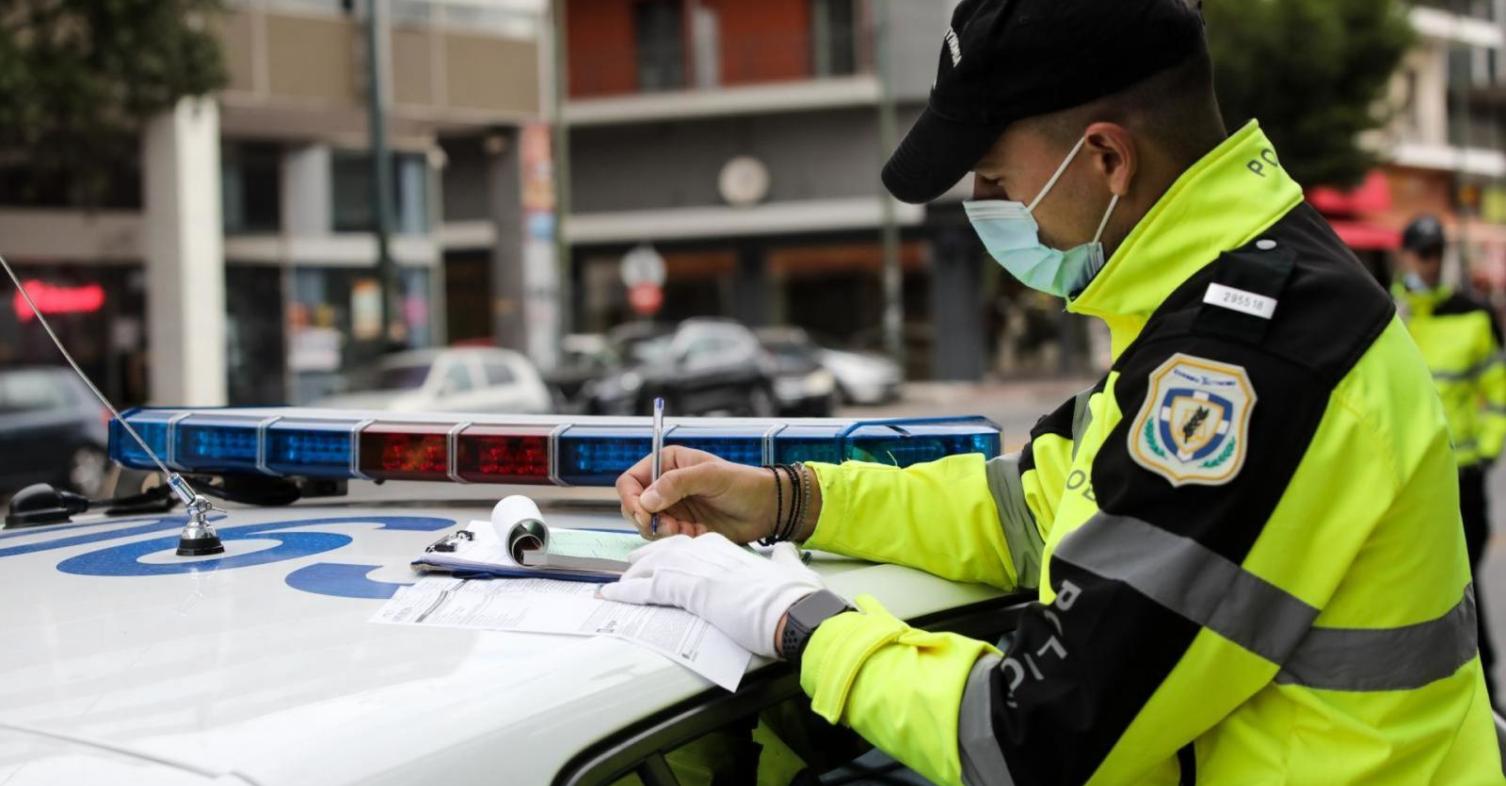 Traffic Police fine for helmet on car driver
